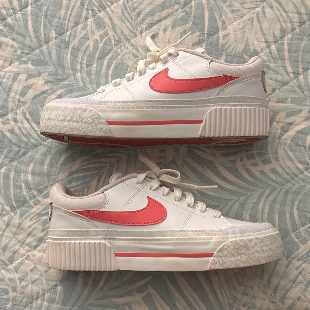 Woman’s White and Pink Nike Sneakers